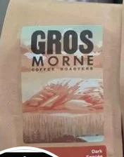 Gros Morne Coffee Roasters dark roast whole-bean coffee bag with a red mountain label