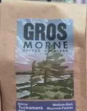 Gros Morne Coffee Roasters Tuckamore, medium-dark roast whole-bean coffee bag with a spruce tree label